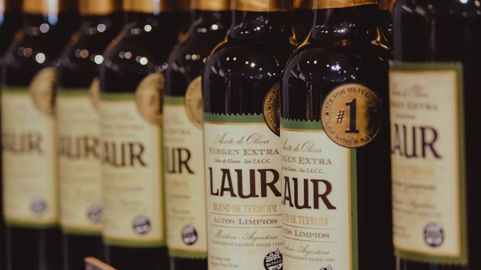 Italian extra virgin olive oil in dark glass bottles prepared for wholesale export