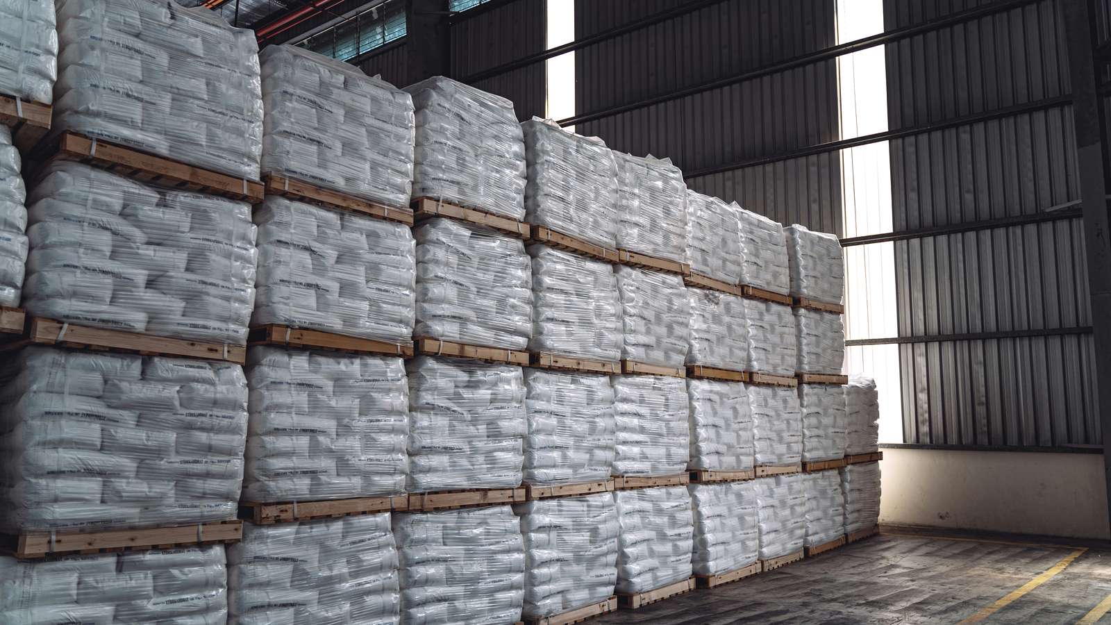 Pallets of food goods stacked in an Italian export warehouse